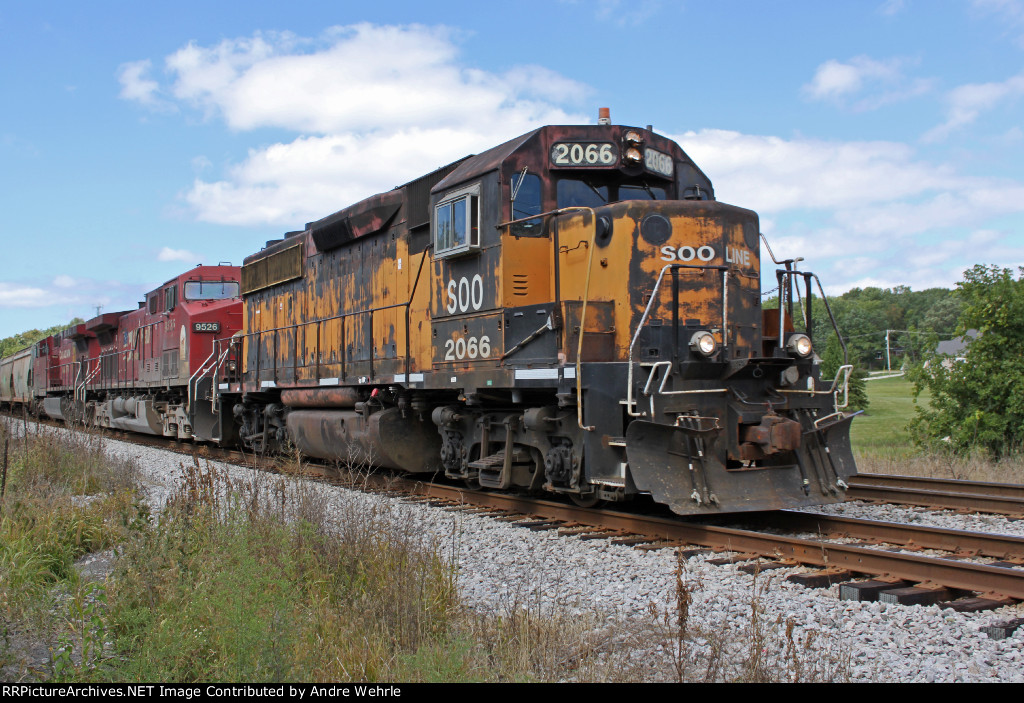 Bandit GP40 leads an EB potash train across Springdale Road